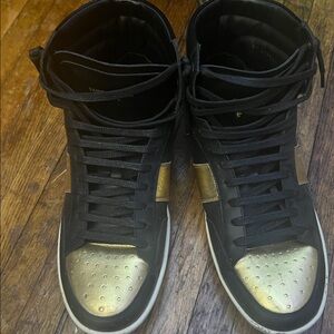Saint Laurent Black Sneakers with Gold Highlights